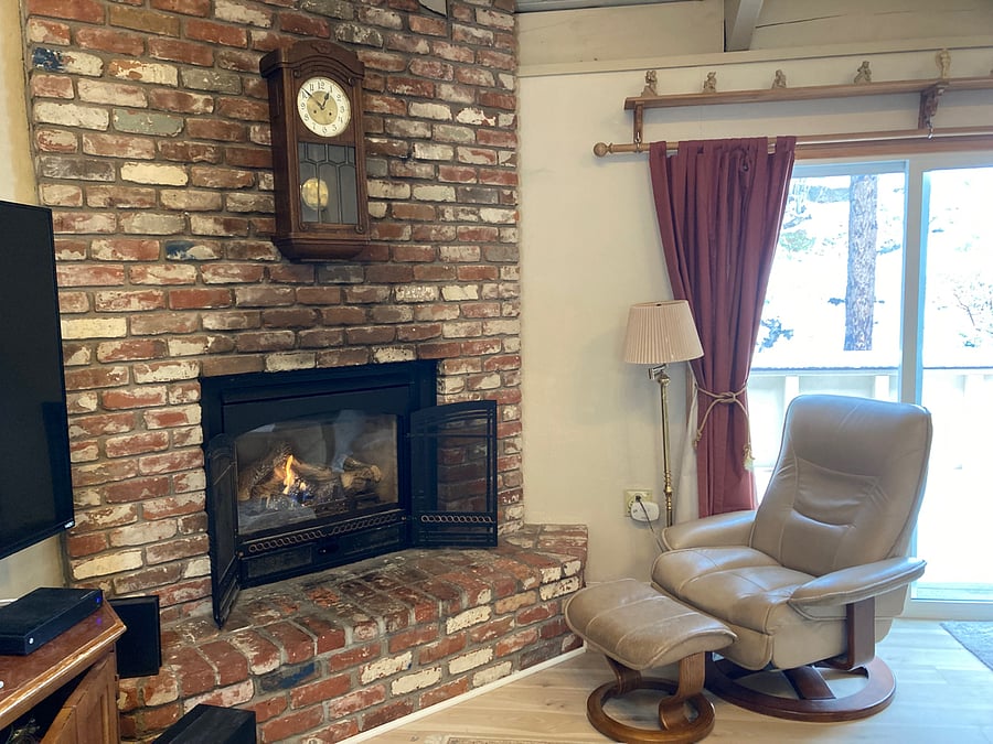 Reading nook by fireplace