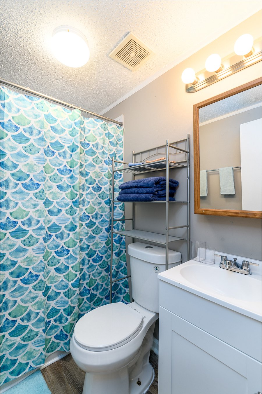 Upstairs bathroom with tub