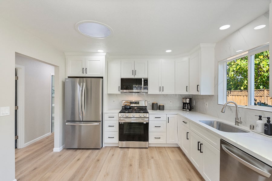 New Stainless Steel appliances. Fridge with ice maker and internal water dispenser.  