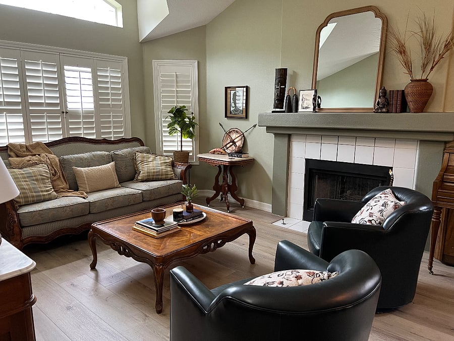 Living room with gas fireplace. Vaulted ceilings.