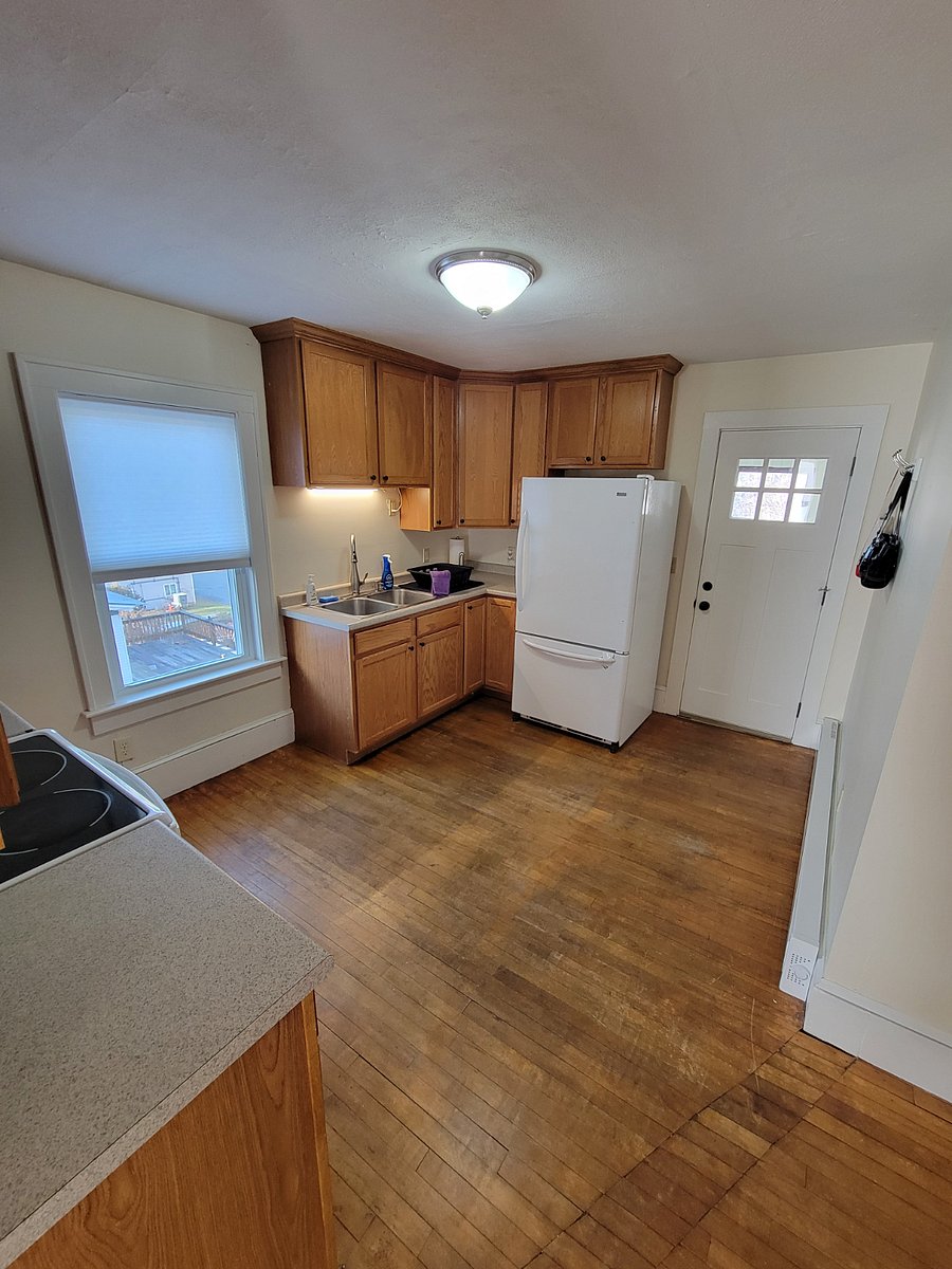 Unit #2 Kitchen with view of back entrance - second floor