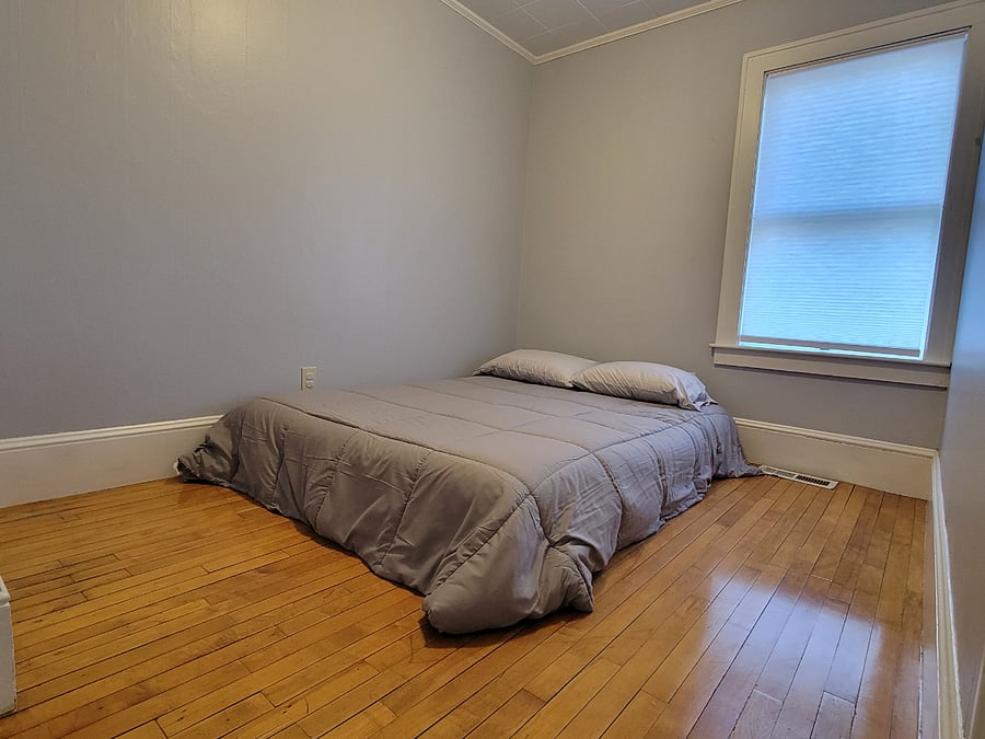 Unit #1 - 2nd Bedroom (note - picture shows mattress on floor b/c of tenant request - bedframe available 