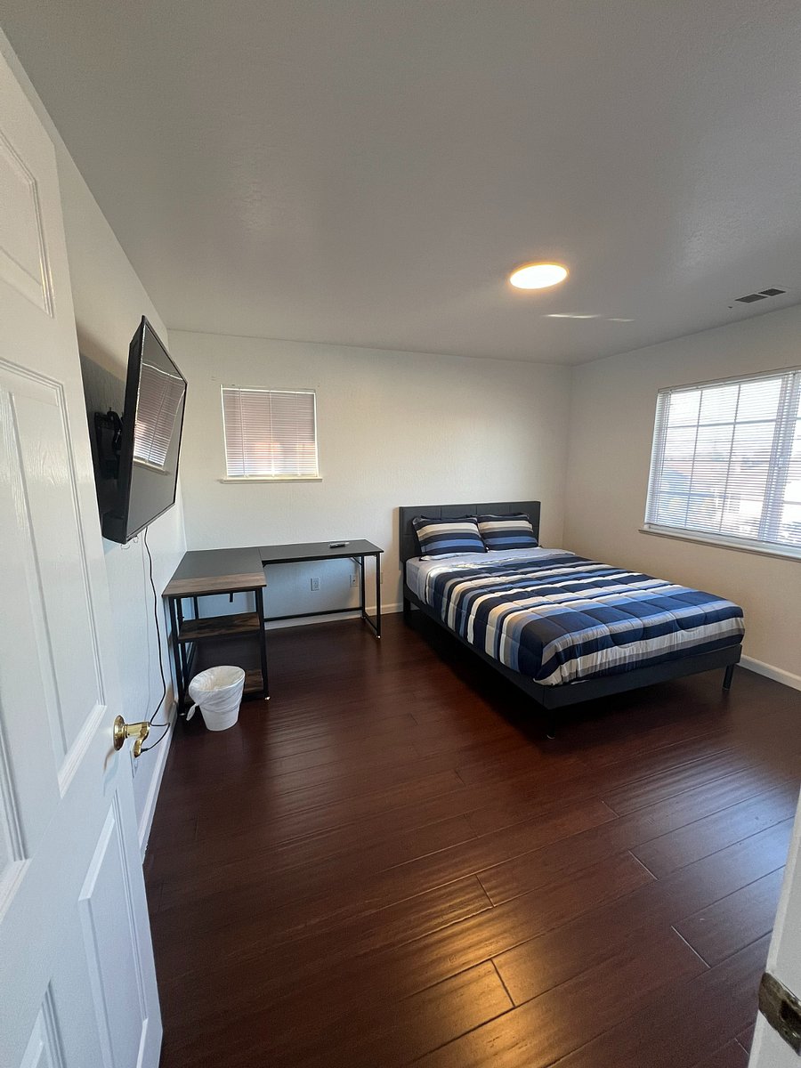 Bedroom 1- Queen size bed, 50" smart TV. office table.