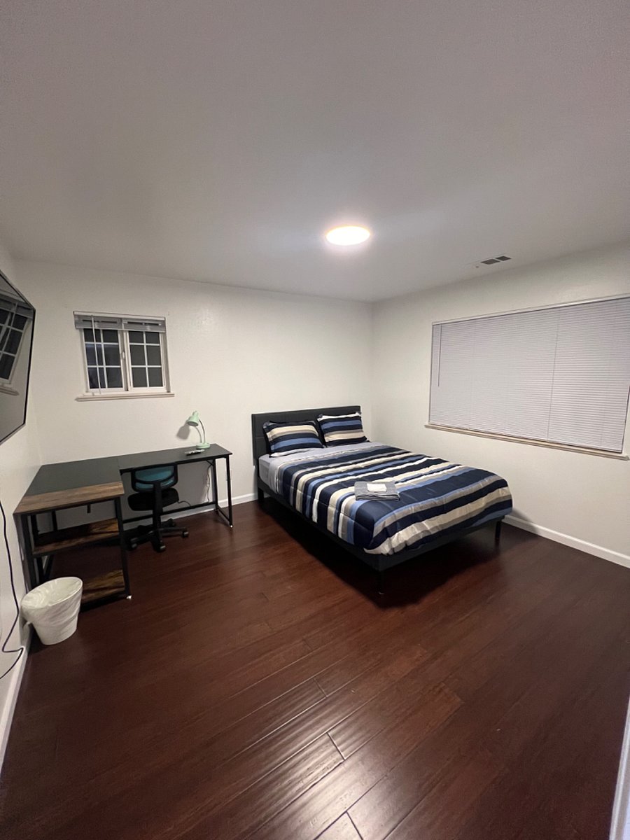 Bedroom 1- Queen size bed, 50" smart TV. office table.