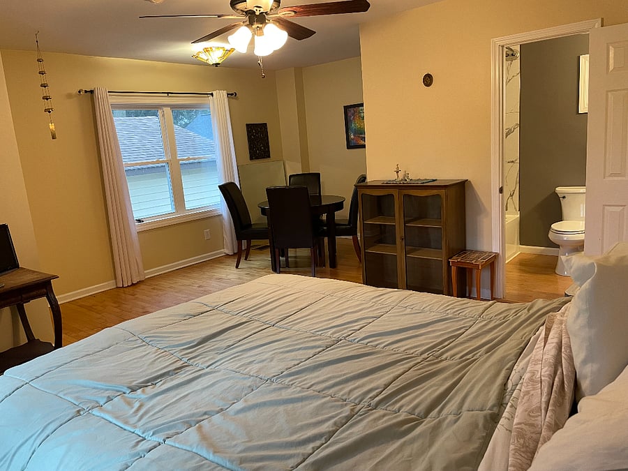 The room is more spacious than it appears in this pic. It is bright and airy.