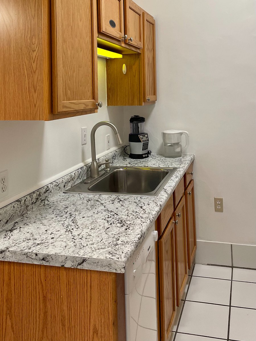 Kitchen sink, cabinets and dishwasher