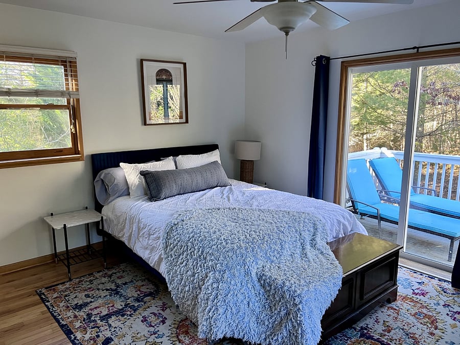 Upstairs bedroom #1 with balcony.