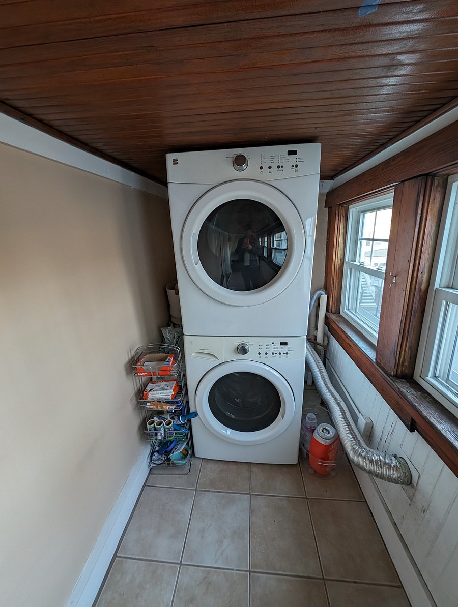 This is the shared laundry room off the kitchen