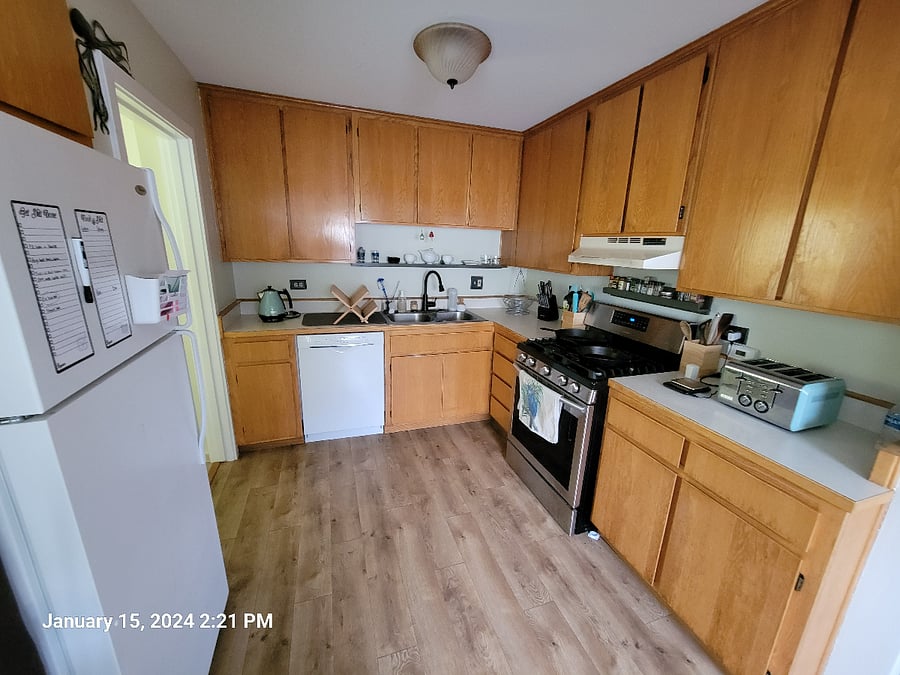 Kitchen - cleaning supplies, pots, pans, cooking implements, toaster, microwave, electric kettle, stand mixer, and more included