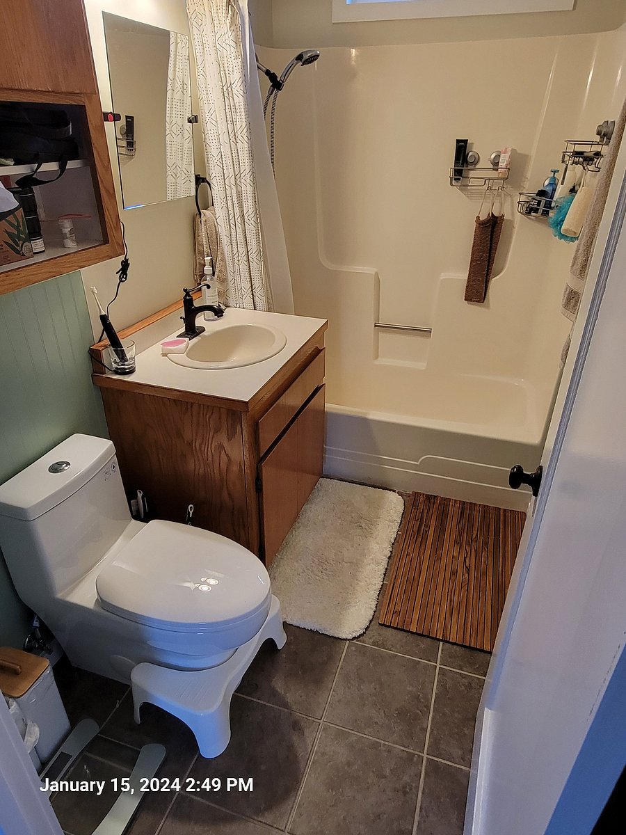 Bathroom - located off of living room and shares a wall with Bedroom 1, cleaning supplies and move in essentials are included