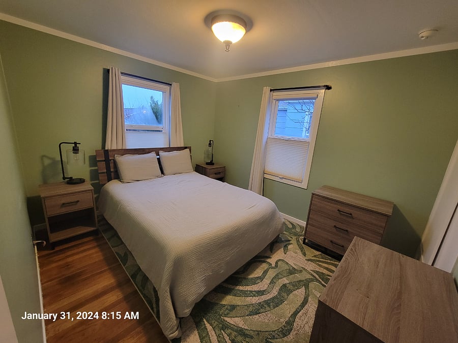 Bedroom 1 - Queen-sized bed with pull-out drawers underneath