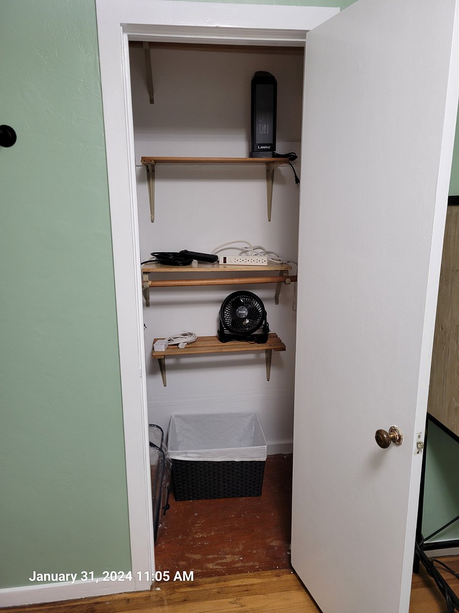 Bedroom 2 - large closet with two rods and multiple shelves