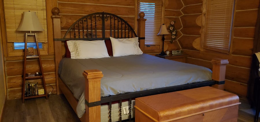 Master Bedroom with private bath and deck access. Main level
