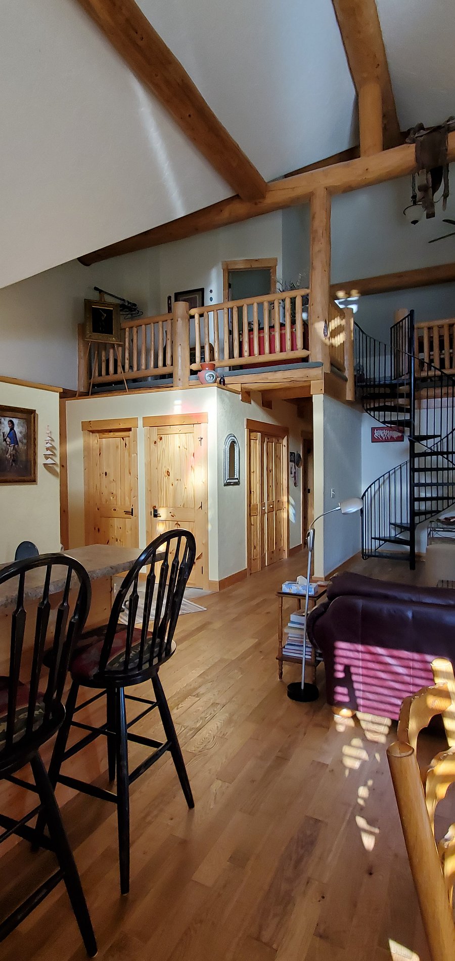 View of loft from dining room and living room