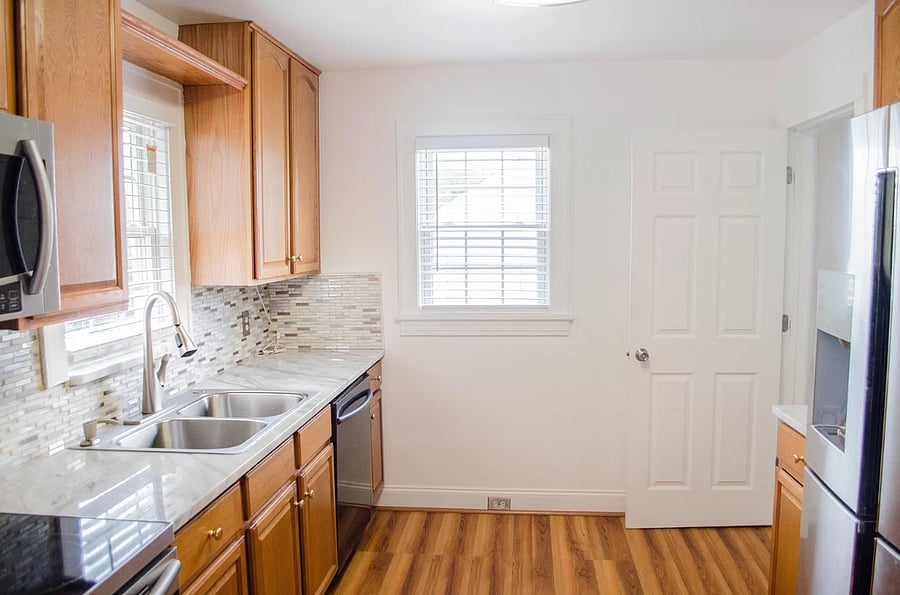 Kitchen view towards side entrance