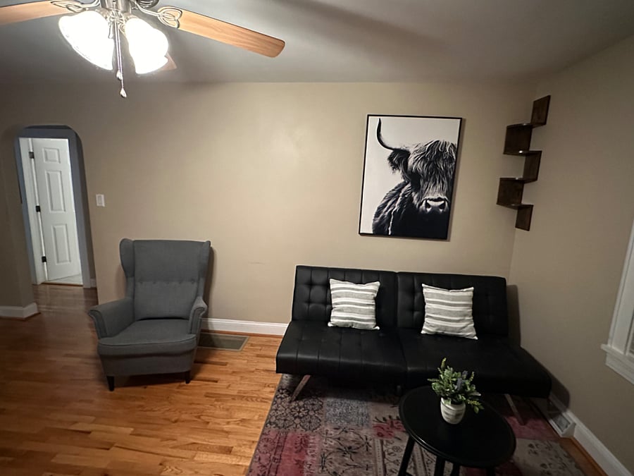 Furnished living room exterior door view