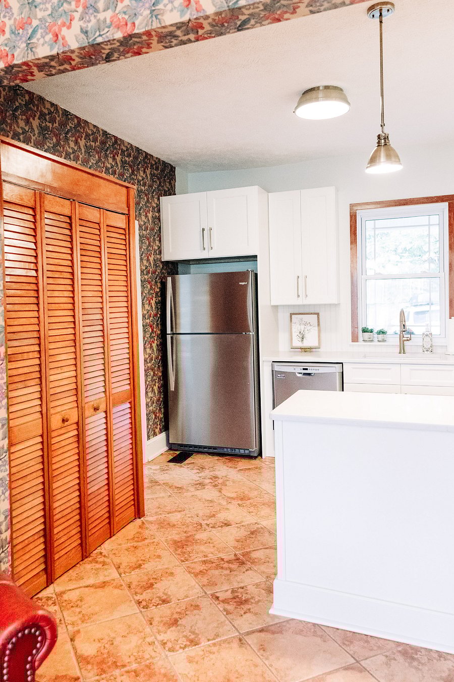 Full size fridge and freezer. Pantry on left for additional storage of kitchen items or misc.