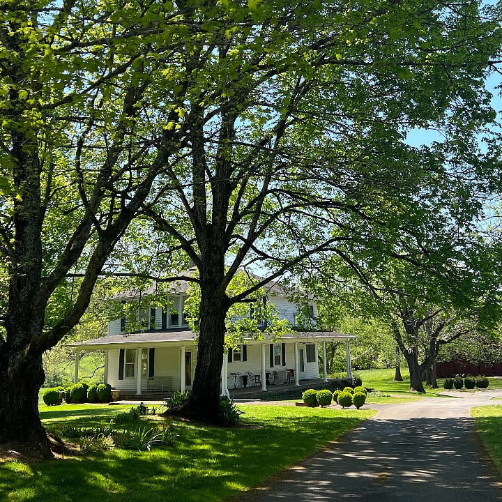 Exterior view during summer. Built in 1925, the home has been lovingly kept and updated.