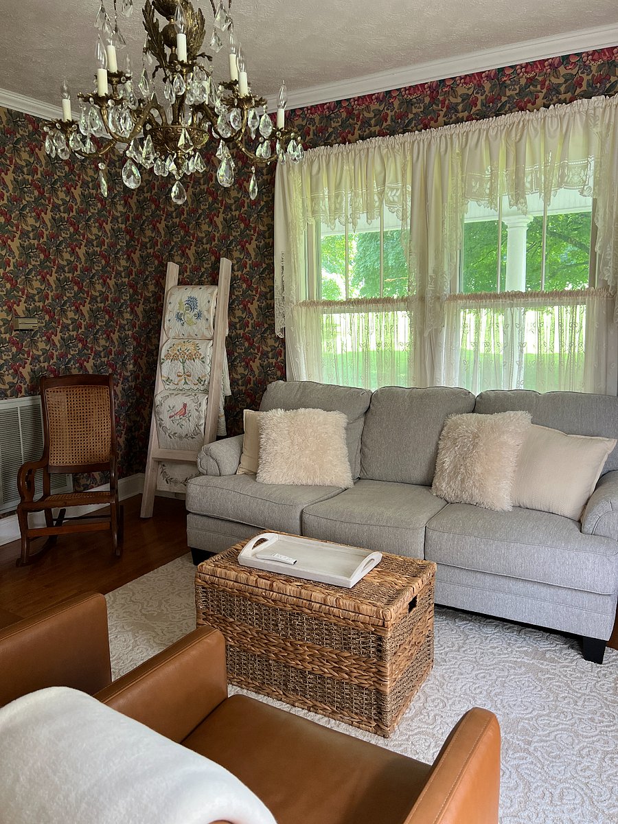 Rocking chair in the corner is a nice spot to relax. Some of my family's quilts are displayed on the quilt ladder. 
