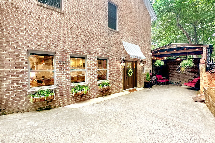 Just outside the front door is a covered patio to relax and unwind.