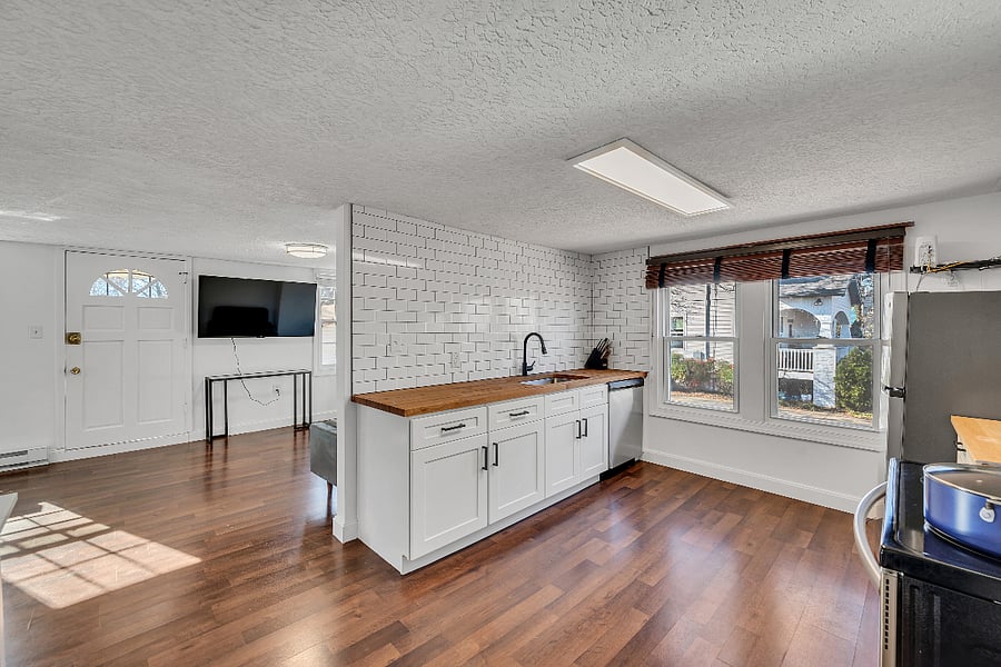 Private full kitchen in the upstairs unit.