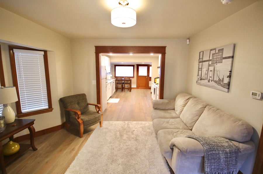 Living room, kitchen, and back door.