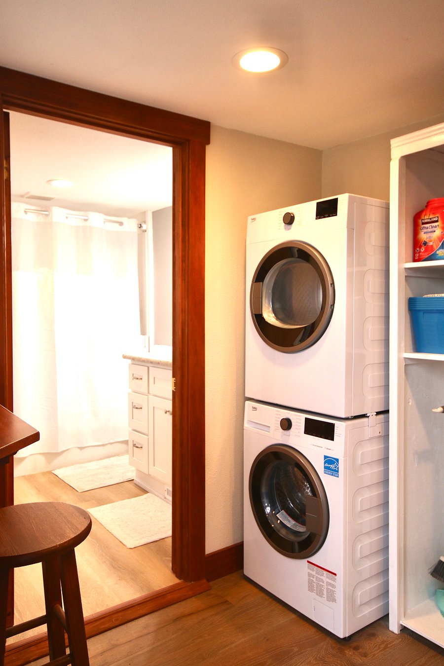 Door to bathroom and washer/dryer.