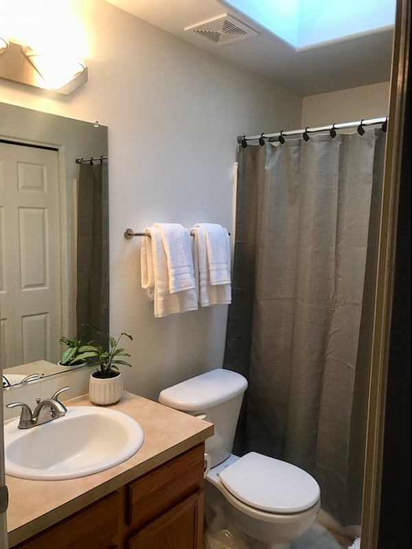 Shared upstairs bathroom with washer and dryer