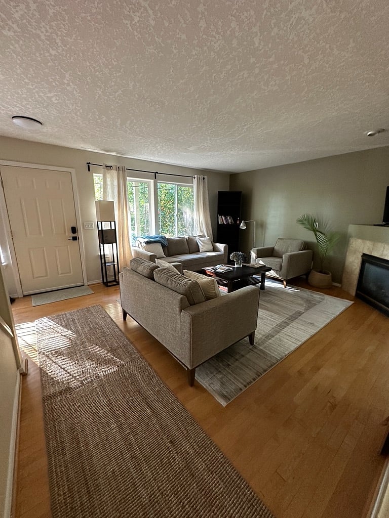 Shared living room with fireplace