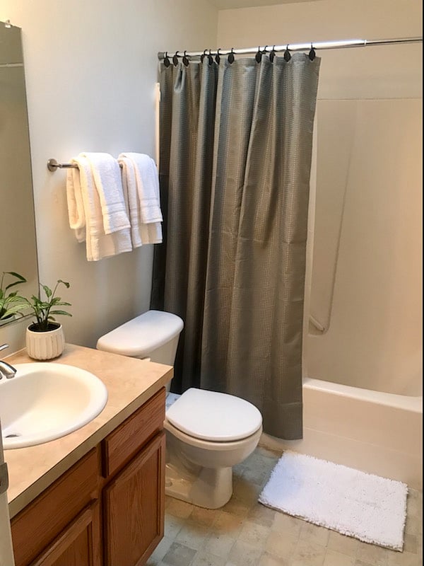 Shared upstairs bathroom with washer and dryer. 