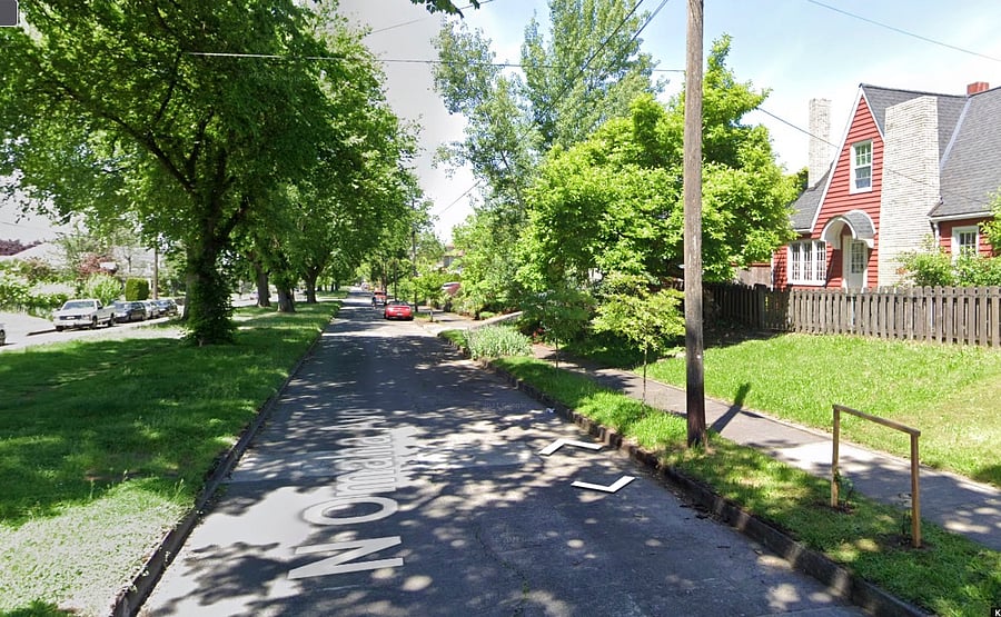 House is situated on a quiet, Elm tree-lined street