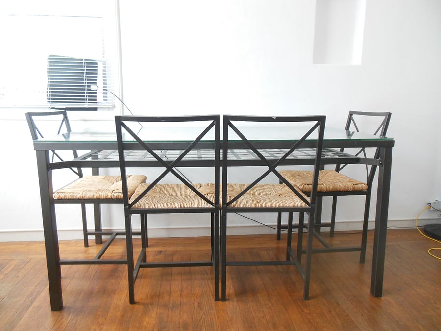 Dining table with four chairs.
