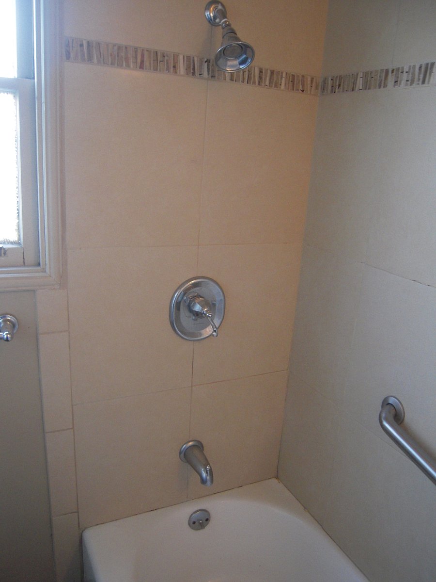 Bathtub and shower.