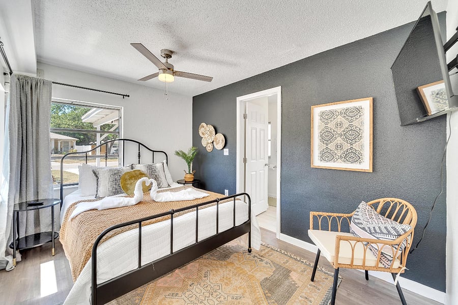 Master bedroom with private bathroom and Smart TV