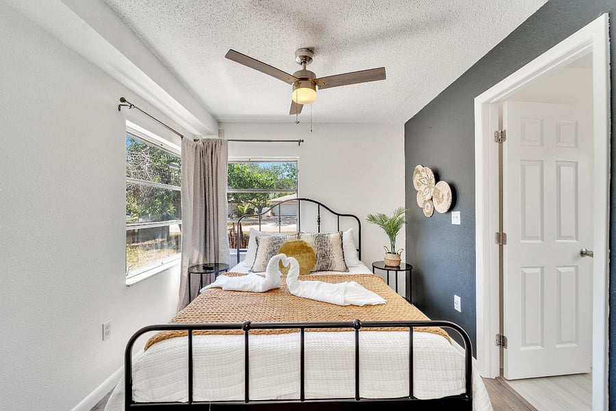 Master bedroom with private bathroom and Smart TV