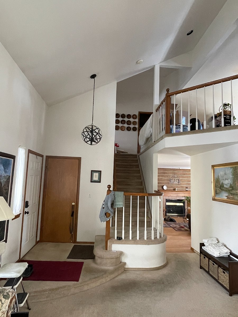 Entry. Three bedrooms upstairs.