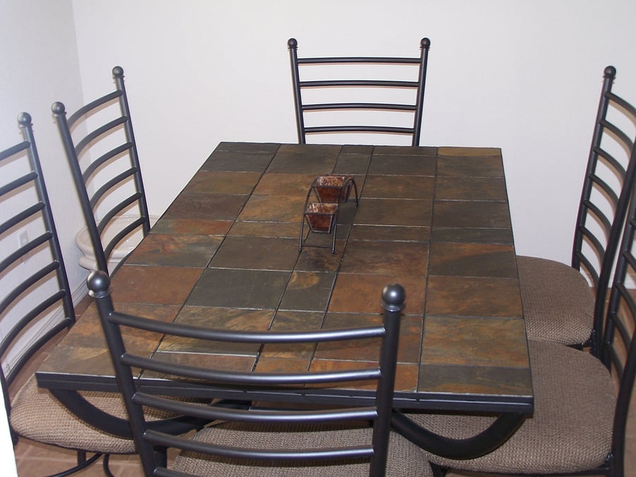 Dining room table seated for 6.  There are two other seated areas at the Elevated Bar area attached to the Kitchen