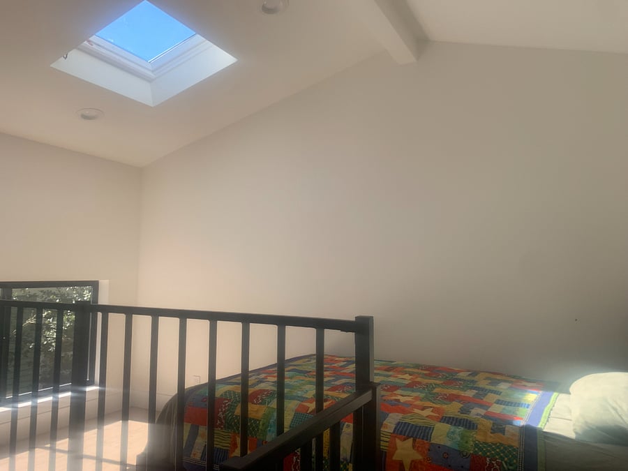 Large loft!! Relax with your window overlooking the trees, or stare up at the sky thru the skylight!! But not to worry, both have custom fitted room darkening shades for sleeping!!