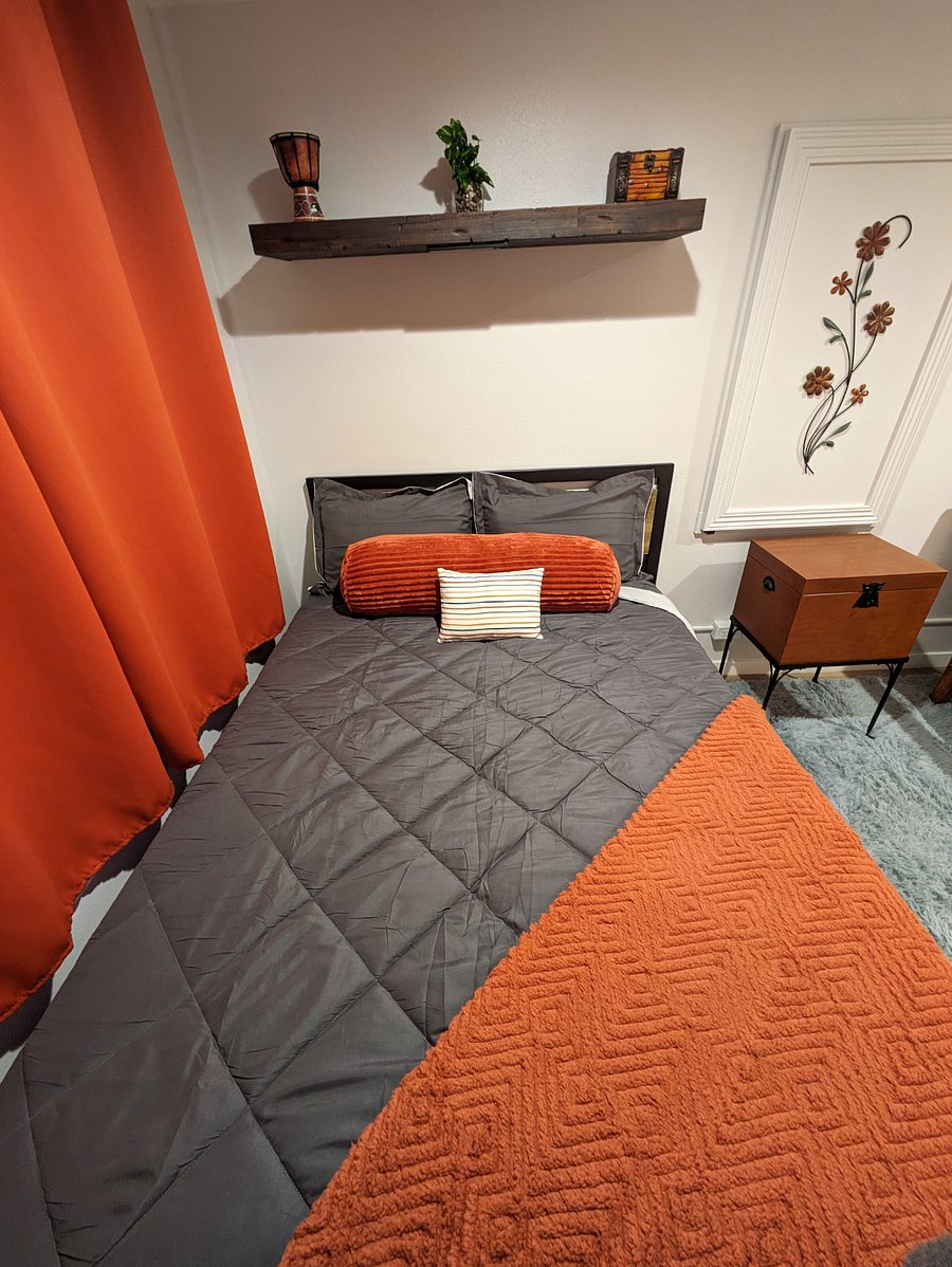 Full size bed with Zinus Green Tea Mattress. Nightstand is a cabinet that can be a locked by the tenant.