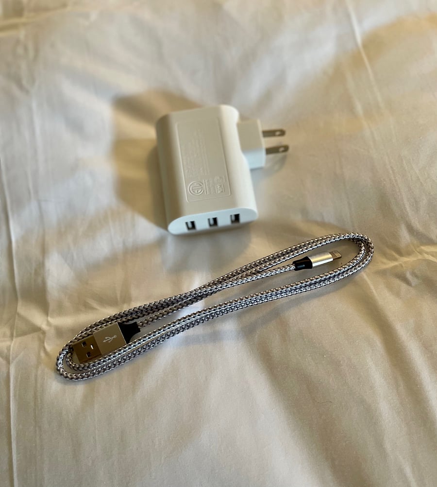 each bedroom is supplied with apple chargers