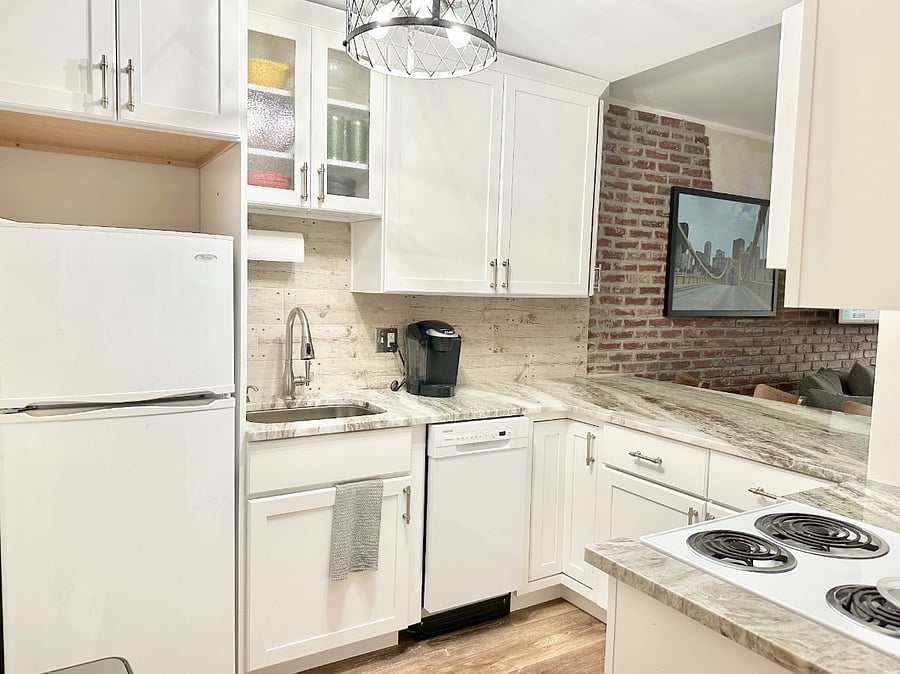 Kitchen with all appliances.