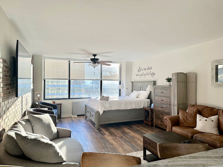 Tasteful neutral decor in a newly renovated studio apartment.