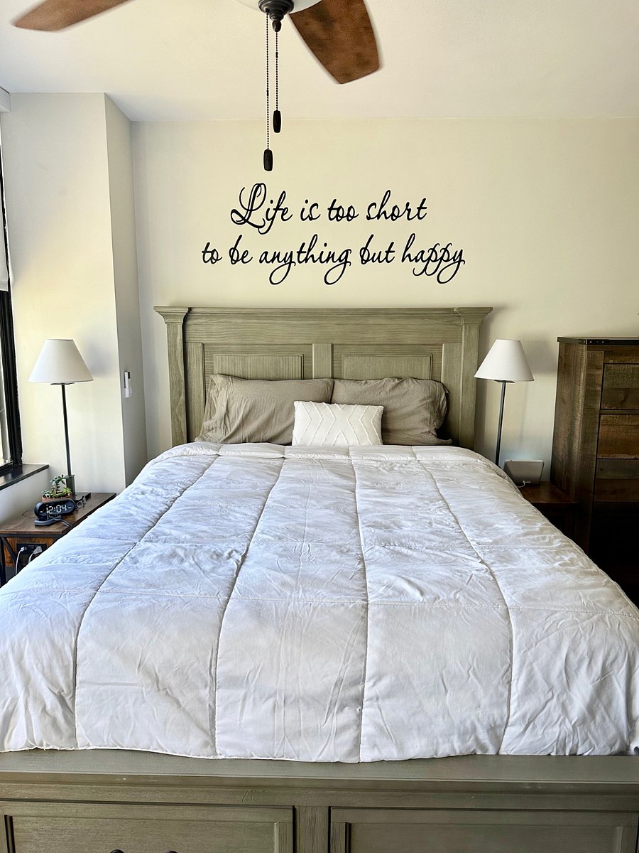 Beautiful elevated queen sized bed with two storage drawers.
