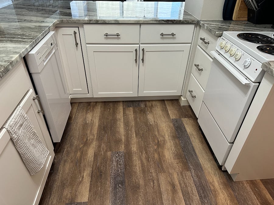Gorgeous new floors and brand new dishwasher.