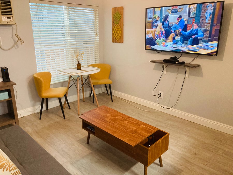 Pull up coffee table for to serve as an additional workspace.