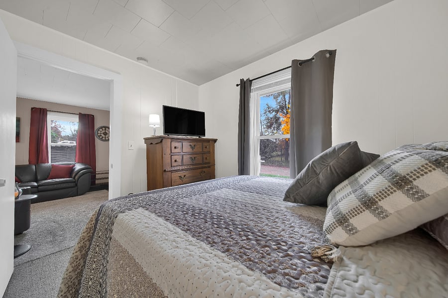Primary Bedroom. Room darkening blinds, plenty of fresh linens and storage.