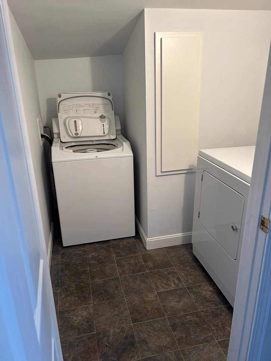 Separate laundry room on same level but outside of living space to reduce noises etc