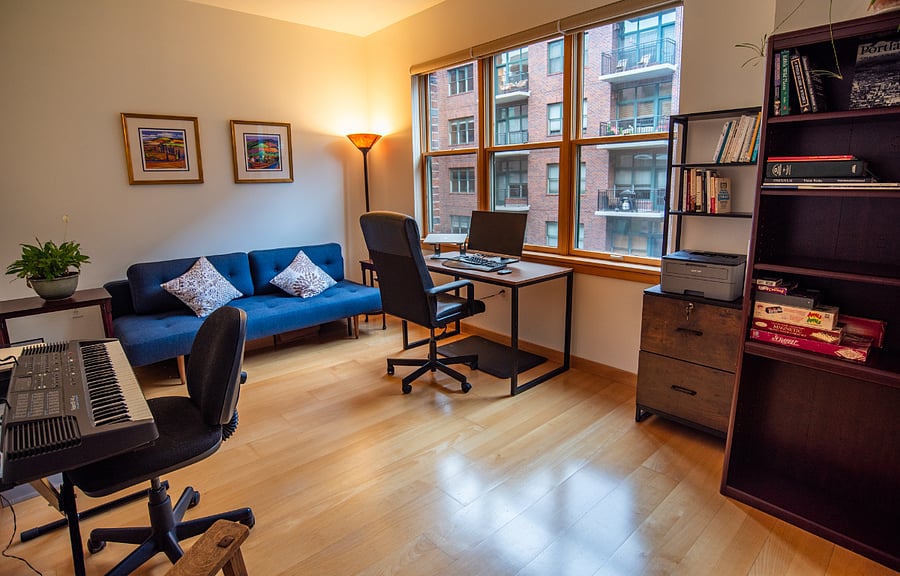 Work / guest space w/ convertible sleeper sofa. Technology hardware not included.