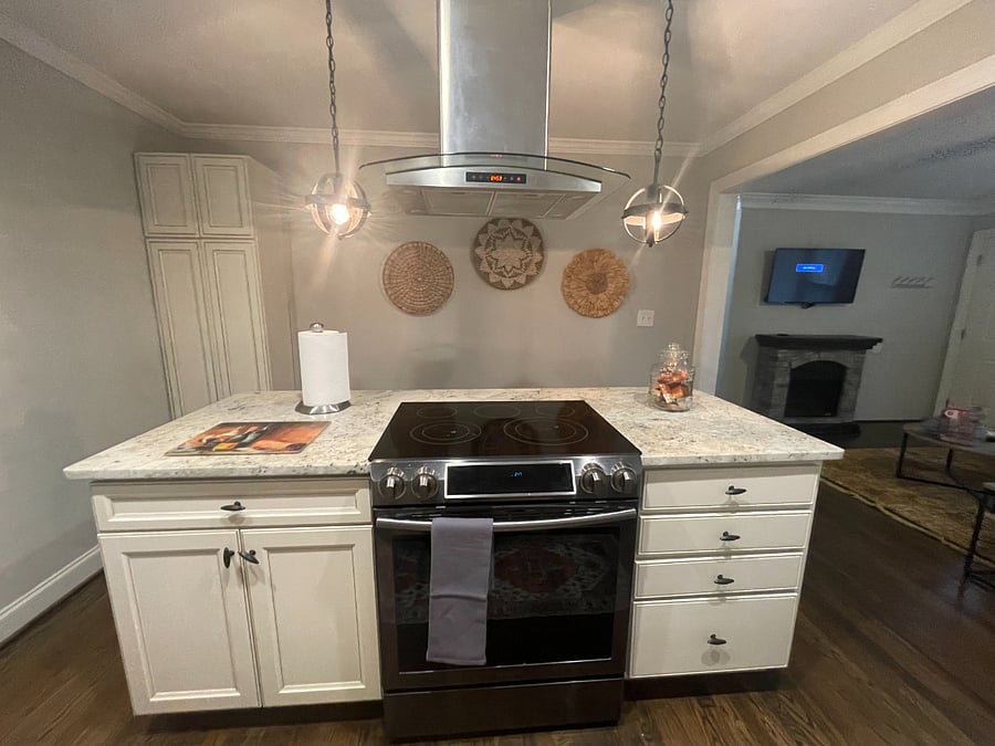 Easy to clean cooking surface and vented hood.