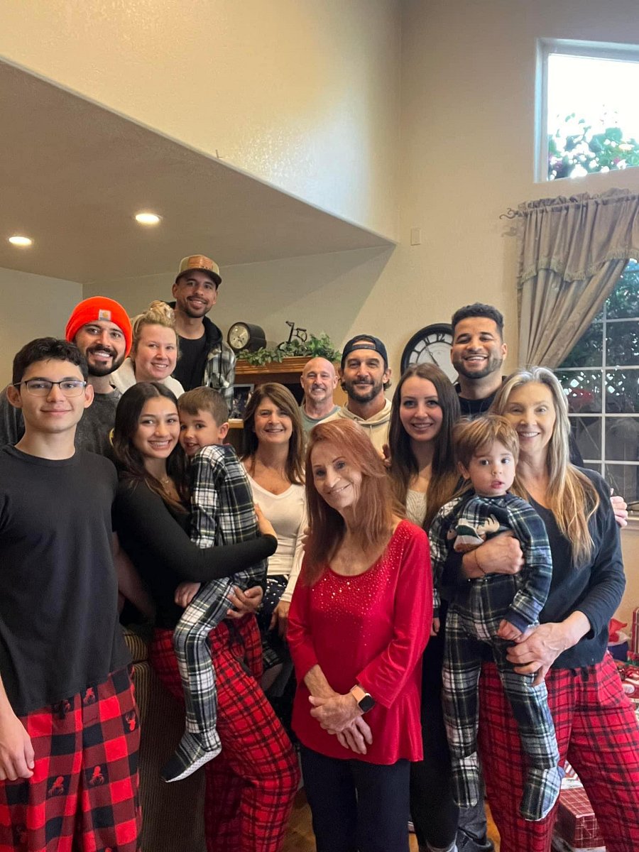My family and me in the front room/living room Christmas morning :)
(I'm the one on the right, holding my grandson.)